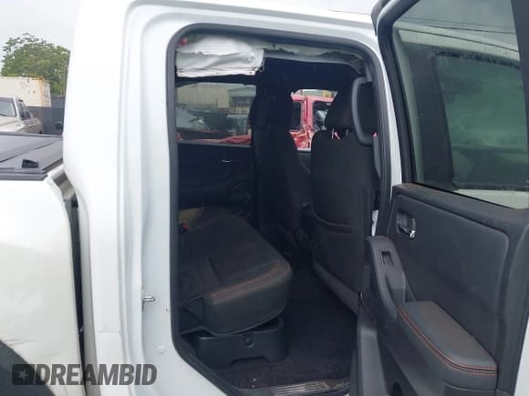 ✅ 2023 Nissan Frontier Pro-4X • VIN: 1N6ED1EK6PN668535 • Lot: 43045490. Wystawiony na IAAI z przebiegiem 73 465 mil. Bezpłatny archiwum sprzedaży aukcyjnych z USA i szczegółowy raport historii pojazdu na DreamBid. Zdjęcie 8.