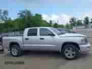 2008 Dodge Dakota SXT z VIN 1D7HW38K98S594036, wystawiony jako IAAI lot #42418267 z przebiegiem 77 135 mil mil oraz . Historia ofert i sprzedaży dostępna na DreamBid. Obrazek 14.