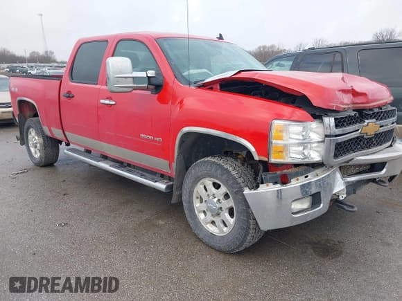 ✅ 2014 Chevrolet Silverado 2500HD LT • VIN: 1GC1KXC83EF123062 • Lot: 43737405. Listed on IAAI with 277,277 mi. Free auction sales archive from the USA and detailed vehicle history report at DreamBid. Image 1.