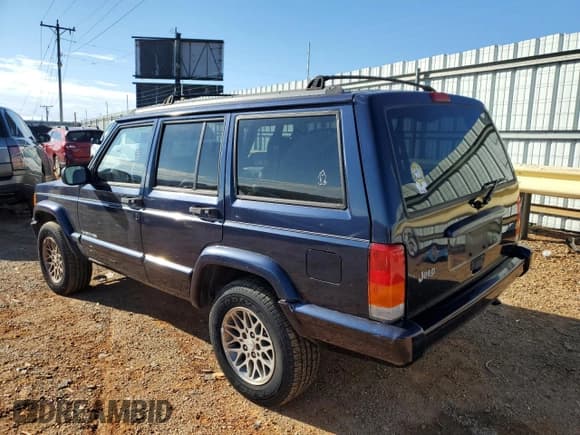 ✅ 1997 Jeep Cherokee Country • VIN: 1J4FJ78S1VL603836 • Lot: 93272635. Listed on Copart with 170,878 mi. Free auction sales archive from the USA and detailed vehicle history report at DreamBid. Image 2.