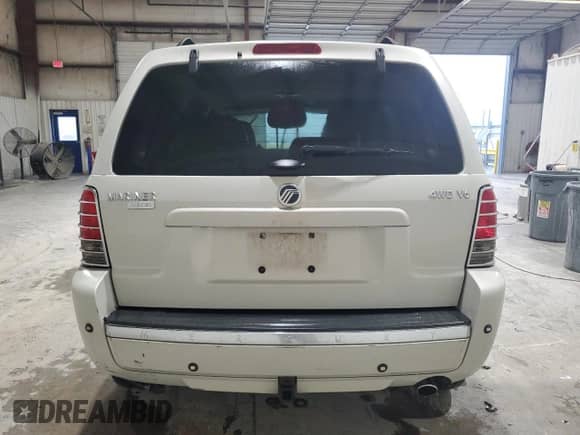 2007 Mercury Mariner Premier с VIN 4M2CU971X7KJ11281, выставлен на аукционе Copart как лот 70717105 с пробегом 149 938 миль миль и Списание • Salvage title. История ставок и продаж доступна на DreamBid. Изображение 6.