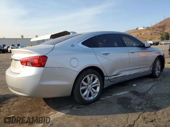 ✅ 2018 Chevrolet Impala LT • VIN: 2G1105S37J9100590 • Лот: 71194434. Опубликован ранее на Copart с пробегом 70 503 миль. Бесплатный доступ к архиву аукционных продаж из США и подробный отчёт об истории автомобиля на DreamBid. Изображение 3.