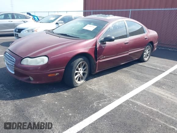 ✅ 2000 Chrysler LHS • VIN: 2C3HC56G1YH413455 • Lot: 42038726. Listed on IAAI with 248,054 mi. Free auction sales archive from the USA and detailed vehicle history report at DreamBid. Image 2.