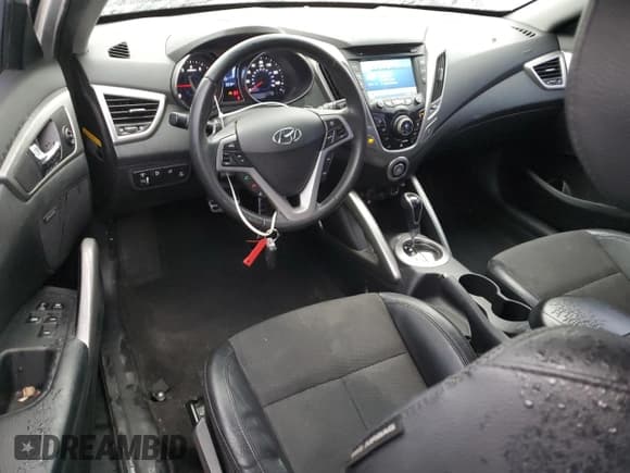 ✅ 2013 Hyundai Veloster w/Gray Int • VIN: KMHTC6AD2DU093056 • Lot: 81179253. Listed on Copart with 144,405 mi. Free auction sales archive from the USA and detailed vehicle history report at DreamBid. Image 8.