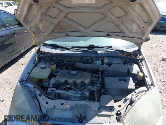 ✅ 2004 Ford Focus LX • VIN: 1FAFP33PX4W155597 • Lot: 42054503. Listed on IAAI with 109,873 mi. Free auction sales archive from the USA and detailed vehicle history report at DreamBid. Image 10.