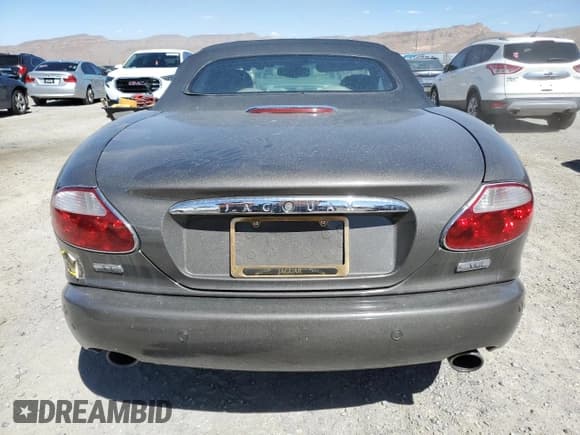 ✅ 2005 Jaguar XK XK8 • VIN: SAJDA42C452A41017 • Лот: 65583134. Опубликован ранее на Copart с пробегом 143 024 миль. Бесплатный доступ к архиву аукционных продаж из США и подробный отчёт об истории автомобиля на DreamBid. Изображение 6.