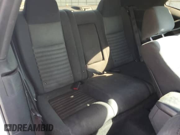 2013 Dodge Challenger SXT z VIN 2C3CDYAG4DH704333, wystawiony jako Copart lot #69514464 z przebiegiem 126 734 mil mil oraz Szkoda całkowita • Salvage title. Historia ofert i sprzedaży dostępna na DreamBid. Obrazek 10.