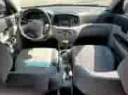 2010 Hyundai Accent GLS z VIN KMHCN4AC0AU500325, wystawiony jako Copart lot #73556964 z przebiegiem 132 365 mil mil oraz Szkoda całkowita • Salvage title. Historia ofert i sprzedaży dostępna na DreamBid. Obrazek 8.