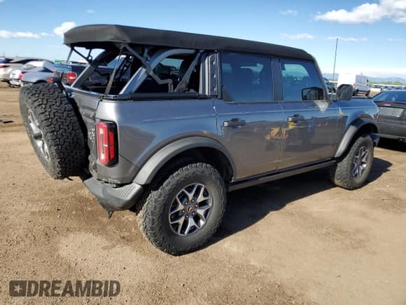 ✅ 2023 Ford Bronco • VIN: 1FMEE5DP0PLC10002 • Lot: 57272555. Wystawiony na Copart z przebiegiem 14 035 mil. Bezpłatny archiwum sprzedaży aukcyjnych z USA i szczegółowy raport historii pojazdu na DreamBid. Zdjęcie 3.