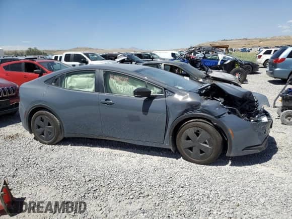 2025 Toyota Prius LE z VIN JTDACAAU1S3062446, wystawiony jako Copart lot #66959305 z przebiegiem Nie podano mil oraz Szkoda całkowita • Salvage title. Historia ofert i sprzedaży dostępna na DreamBid. Obrazek 4.