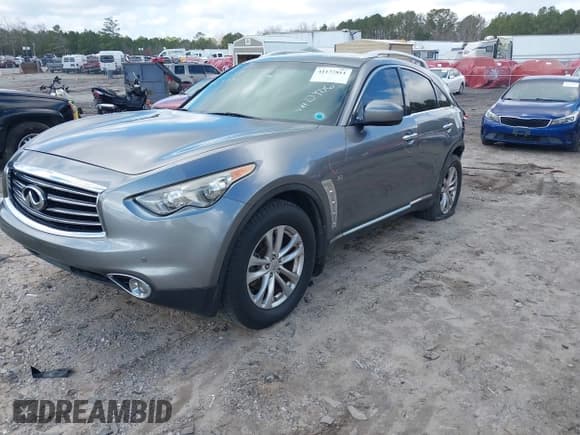 ✅ 2015 Infiniti QX70 • VIN: JN8CS1MWXFM480906 • Лот: 41177811. Опубликован ранее на IAAI с пробегом 176 527 миль. Бесплатный доступ к архиву аукционных продаж из США и подробный отчёт об истории автомобиля на DreamBid. Изображение 17.