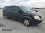 2012 Dodge Grand Caravan SXT z VIN 2C4RDGCG9CR198584, wystawiony jako Copart lot #87287765 z przebiegiem 189 694 mil mil oraz Szkoda całkowita • Salvage title. Historia ofert i sprzedaży dostępna na DreamBid. Obrazek 4.