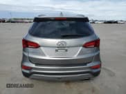 ✅ 2018 Hyundai Santa Fe 2.4L • VIN: 5NMZU3LB4JH060651 • Лот: 69763862. Опубликован ранее на Copart с пробегом 73 770 миль. Бесплатный доступ к архиву аукционных продаж из США и подробный отчёт об истории автомобиля на DreamBid. Изображение 6.