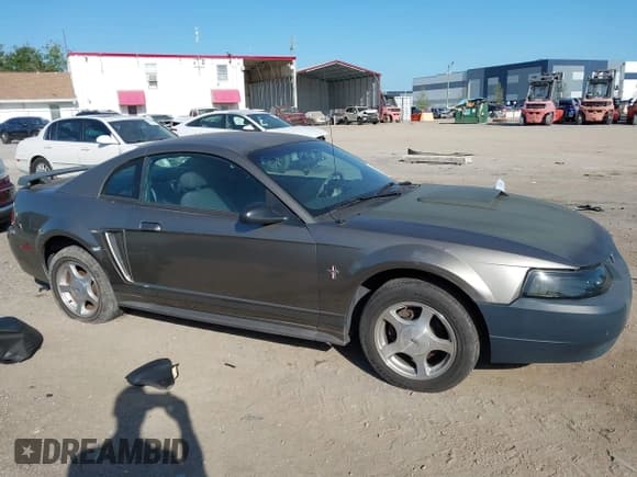 ✅ 2001 Ford Mustang Standard • VIN: 1FAFP40461F264327 • Лот: 42002990. Опубликован ранее на IAAI с пробегом 316 107 миль. Бесплатный доступ к архиву аукционных продаж из США и подробный отчёт об истории автомобиля на DreamBid. Изображение 12.