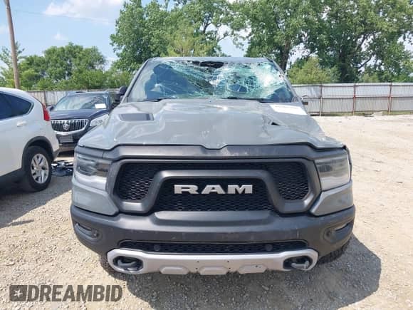 2020 Ram 1500 Rebel z VIN 1C6SRFLM8LN202602, wystawiony jako IAAI lot #42585757 z przebiegiem 46 177 mil mil oraz . Historia ofert i sprzedaży dostępna na DreamBid. Obrazek 12.