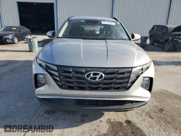 2023 Hyundai Tucson Blue z VIN KM8JBCA18PU123471, wystawiony jako Copart lot #85730945 z przebiegiem 29 261 mil mil oraz Szkoda całkowita • Salvage title. Historia ofert i sprzedaży dostępna na DreamBid. Obrazek 5.