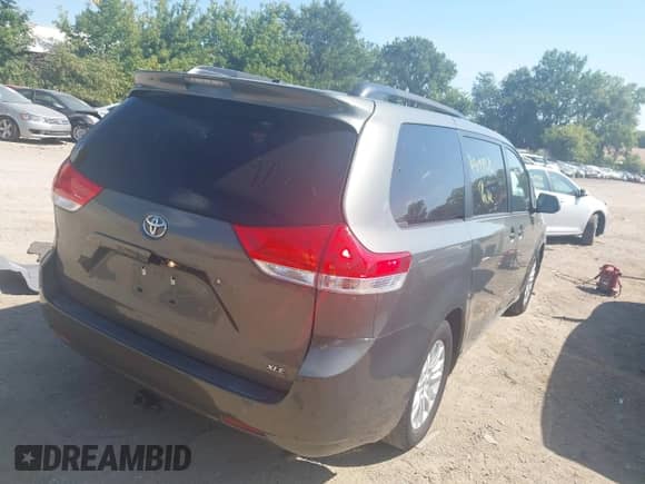 2011 Toyota Sienna XLE AAS with VIN 5TDYK3DC8BS073331, listed as a IAAI auction lot 43099376 with 145,679 mi miles and . Bid and sale history available at DreamBid. Image 4.