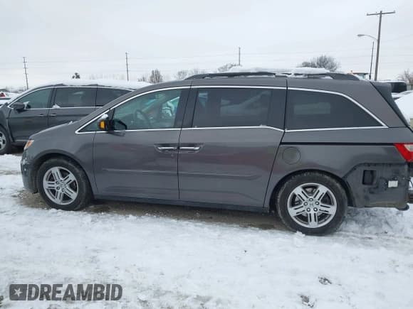 ✅ 2012 Honda Odyssey Touring • VIN: 5FNRL5H95CB049148 • Lot: 43831103. Listed on IAAI with 288,928 mi. Free auction sales archive from the USA and detailed vehicle history report at DreamBid. Image 15.
