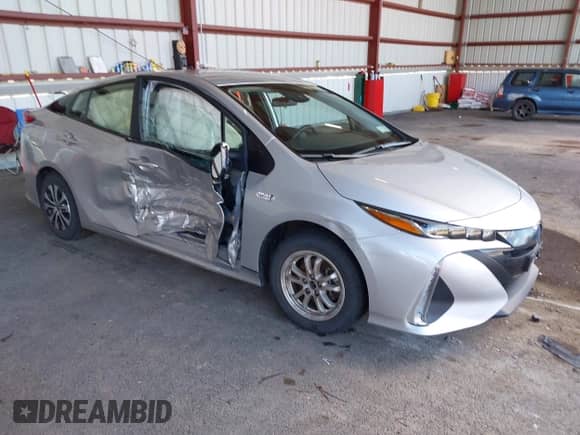 2021 Toyota Prius Limited z VIN JTDKAMFP9M3187986, wystawiony jako IAAI lot #43398563 z przebiegiem 38 772 mil mil oraz . Historia ofert i sprzedaży dostępna na DreamBid. Obrazek 1.