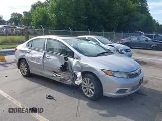 ✅ 2012 Honda Civic EX-L • VIN: 19XFB2F95CE327964 • Lot: 42895662. Listed on IAAI with 160,757 mi. Free auction sales archive from the USA and detailed vehicle history report at DreamBid. Image 1.