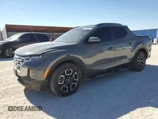 2023 Hyundai Santa Cruz SEL Premium с VIN 5NTJDDAF0PH041682, выставлен на аукционе Copart как лот 77800854 с пробегом 16 240 миль миль и Списание • Salvage title. История ставок и продаж доступна на DreamBid. Изображение 1.