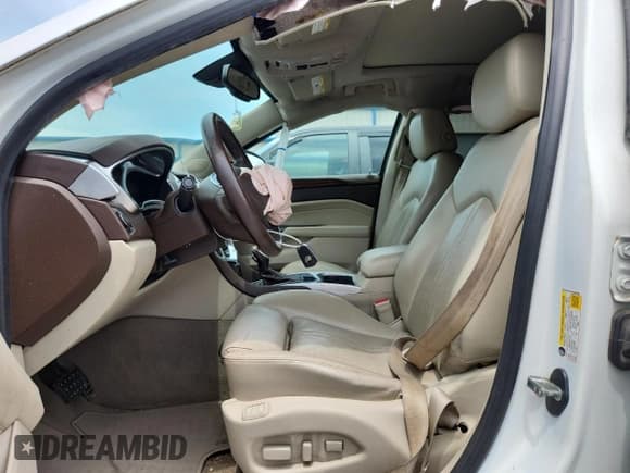 ✅ 2016 Cadillac SRX Premium Collection • VIN: 3GYFNDE39GS546265 • Lot: 65597945. Wystawiony na Copart z przebiegiem 145 591 mil. Bezpłatny archiwum sprzedaży aukcyjnych z USA i szczegółowy raport historii pojazdu na DreamBid. Zdjęcie 7.