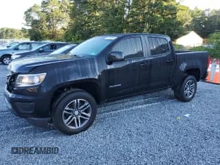 ✅ 2020 Chevrolet Colorado 2WD Work Truck • VIN: 1GCGSBEN5L1160592 • Лот: 67855034. Опубликован ранее на Copart с пробегом 122 754 миль. Бесплатный доступ к архиву аукционных продаж из США и подробный отчёт об истории автомобиля на DreamBid. Изображение 1.