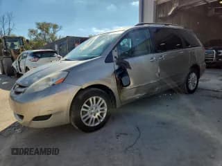 ✅ 2009 Toyota Sienna LE • VIN: 5TDBK23C09S024118 • Lot: 85581515. Listed on Copart with 195,245 mi. Free auction sales archive from the USA and detailed vehicle history report at DreamBid. Image 1.