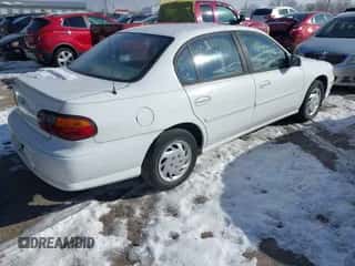 1999 Chevrolet Malibu z VIN 1G1ND52M2XY166192, wystawiony jako IAAI lot #41349158 z przebiegiem 136 003 mil mil oraz . Historia ofert i sprzedaży dostępna na DreamBid. Obrazek 4.