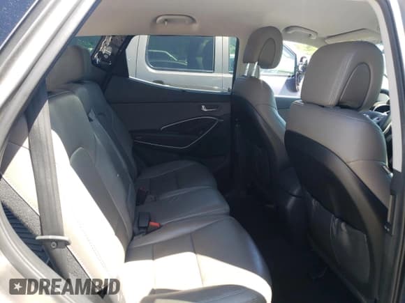 ✅ 2018 Hyundai Santa Fe 2.4L • VIN: 5XYZUDLB3JG568030 • Лот: 57655804. Опубликован ранее на Copart с пробегом 105 599 миль. Бесплатный доступ к архиву аукционных продаж из США и подробный отчёт об истории автомобиля на DreamBid. Изображение 11.