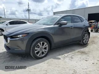✅ 2021 Mazda CX-30 Preferred • VIN: 3MVDMACL6MM319163 • Lot: 80503845. Wystawiony na Copart z przebiegiem 45 962 mil. Bezpłatny archiwum sprzedaży aukcyjnych z USA i szczegółowy raport historii pojazdu na DreamBid. Zdjęcie 1.