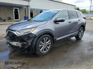 ✅ 2021 Honda CR-V Touring • VIN: 7FARW2H95ME011379 • Lot: 64828375. Listed on Copart with 118,035 mi. Free auction sales archive from the USA and detailed vehicle history report at DreamBid. Image 1.