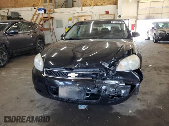 2013 Chevrolet Impala Police с VIN 2G1WD5E3XD1258334, выставлен на аукционе Copart как лот 61849625 с пробегом 99 903 миль миль и Списание • Salvage title. История ставок и продаж доступна на DreamBid. Изображение 5.