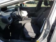 ✅ 2024 Toyota Prius LE • VIN: JTDACAAUXR3046093 • Lot: 90372365. Wystawiony na Copart z przebiegiem 15 281 mil. Bezpłatny archiwum sprzedaży aukcyjnych z USA i szczegółowy raport historii pojazdu na DreamBid. Zdjęcie 7.