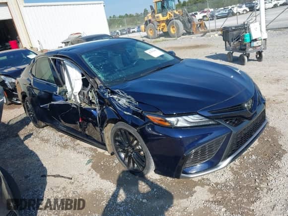 2021 Toyota Camry XSE with VIN 4T1K61AK4MU615383, listed as a IAAI auction lot 43193305 with 57,706 mi miles and . Bid and sale history available at DreamBid. Image 1.