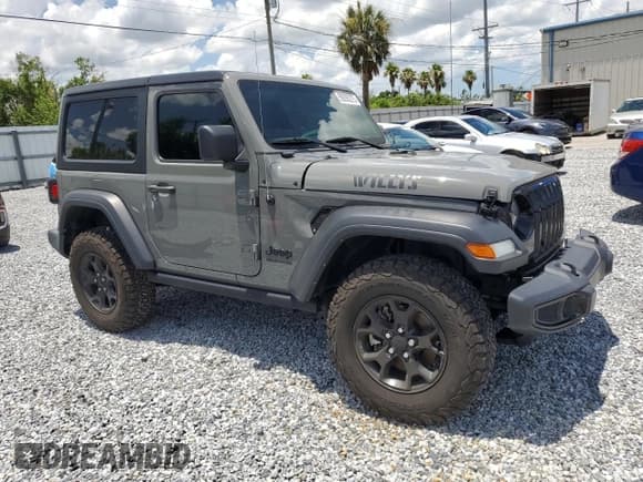 ✅ 2022 Jeep Wrangler Willys Sport • VIN: 1C4GJXANXNW210785 • Lot: 59355275. Listed on Copart with 25,887 mi. Free auction sales archive from the USA and detailed vehicle history report at DreamBid. Image 4.