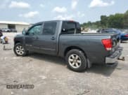 ✅ 2010 Nissan Titan SE • VIN: 1N6BA0ED6AN300905 • Lot: 71772605. Listed on Copart with 303,704 mi. Free auction sales archive from the USA and detailed vehicle history report at DreamBid. Image 2.