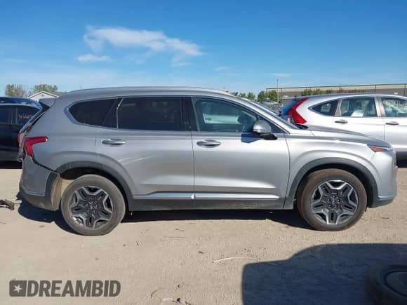 2023 Hyundai Santa Fe Limited with VIN 5NMS44AL4PH560563, listed as a IAAI auction lot 43364626 with 50,987 mi miles and . Bid and sale history available at DreamBid. Image 13.