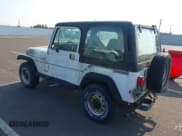 ✅ 1990 Jeep Wrangler S • VIN: 2J4FY19E5LJ525128 • Lot: 42539940. Listed on IAAI with 132,043 mi. Free auction sales archive from the USA and detailed vehicle history report at DreamBid. Image 3.