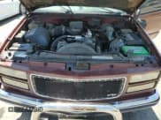 ✅ 1998 GMC Sierra 1500 • VIN: 1GTEK19R1WR511373 • Лот: 60080685. Опубликован ранее на Copart с пробегом 178 199 миль. Бесплатный доступ к архиву аукционных продаж из США и подробный отчёт об истории автомобиля на DreamBid. Изображение 11.