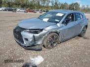 ✅ 2023 Lexus UX 250h Premium • VIN: JTHP9JBH7P2064515 • Lot: 43382117. Listed on IAAI with 32,348 mi. Free auction sales archive from the USA and detailed vehicle history report at DreamBid. Image 2.