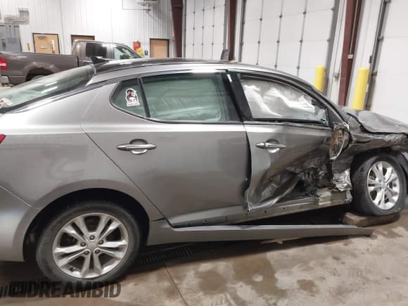 ✅ 2013 Kia Optima EX • VIN: 5XXGN4A76DG094246 • Lot: 43196300. Listed on IAAI with 100,294 mi. Free auction sales archive from the USA and detailed vehicle history report at DreamBid. Image 13.