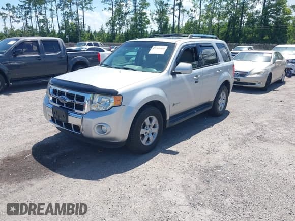✅ 2009 Ford Escape Hybrid • VIN: 1FMCU593X9KA59775 • Lot: 42763464. Listed on IAAI with 142,396 mi. Free auction sales archive from the USA and detailed vehicle history report at DreamBid. Image 2.