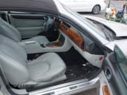 ✅ 2003 Jaguar XK • VIN: SAJDA42C232A34869 • Lot: 42058494. Listed on IAAI with 33,868 mi. Free auction sales archive from the USA and detailed vehicle history report at DreamBid. Image 5.