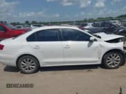 ✅ 2013 Volkswagen Jetta SE • VIN: 3VWDX7AJXDM365203 • Lot: 42551918. Listed on IAAI with 124,946 mi. Free auction sales archive from the USA and detailed vehicle history report at DreamBid. Image 14.