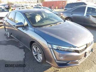 ✅ 2018 Honda Clarity Touring • VIN: JHMZC5F31JC006093 • Lot: 43663650. Listed on IAAI with 56,921 mi. Free auction sales archive from the USA and detailed vehicle history report at DreamBid. Image 1.