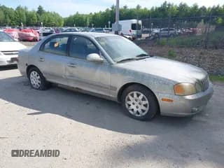 ✅ 2003 Kia Optima LX • VIN: KNAGD126835203006 • Lot: 42418839. Wystawiony na IAAI z przebiegiem 183 798 mil. Bezpłatny archiwum sprzedaży aukcyjnych z USA i szczegółowy raport historii pojazdu na DreamBid. Zdjęcie 1.