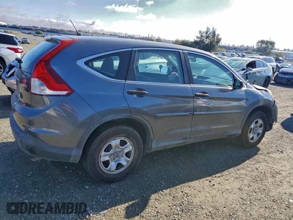 ✅ 2013 Honda CR-V LX • VIN: 2HKRM4H33DH628743 • Лот: 93838165. Опубликован ранее на Copart с пробегом 105 063 миль. Бесплатный доступ к архиву аукционных продаж из США и подробный отчёт об истории автомобиля на DreamBid. Изображение 3.