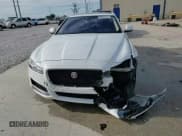 ✅ 2017 Jaguar XF 35t Prestige • VIN: SAJBE4BV4HCY31023 • Lot: 56425255. Listed on Copart with 58,469 mi. Free auction sales archive from the USA and detailed vehicle history report at DreamBid. Image 14.