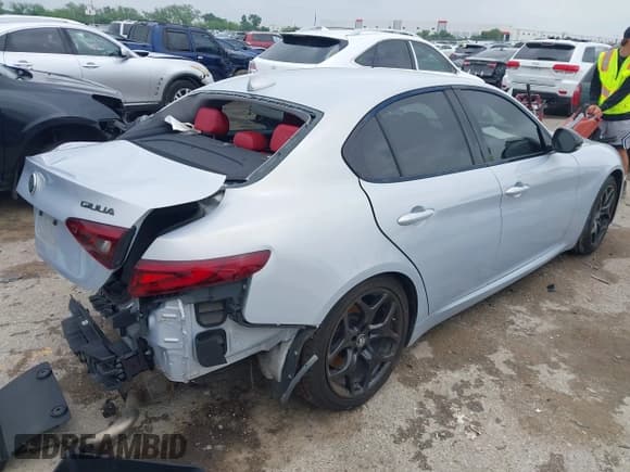 ✅ 2021 Alfa Romeo Giulia • VIN: ZARFAMAN6M7645490 • Lot: 42165037. Listed on IAAI with 57,701 mi. Free auction sales archive from the USA and detailed vehicle history report at DreamBid. Image 4.